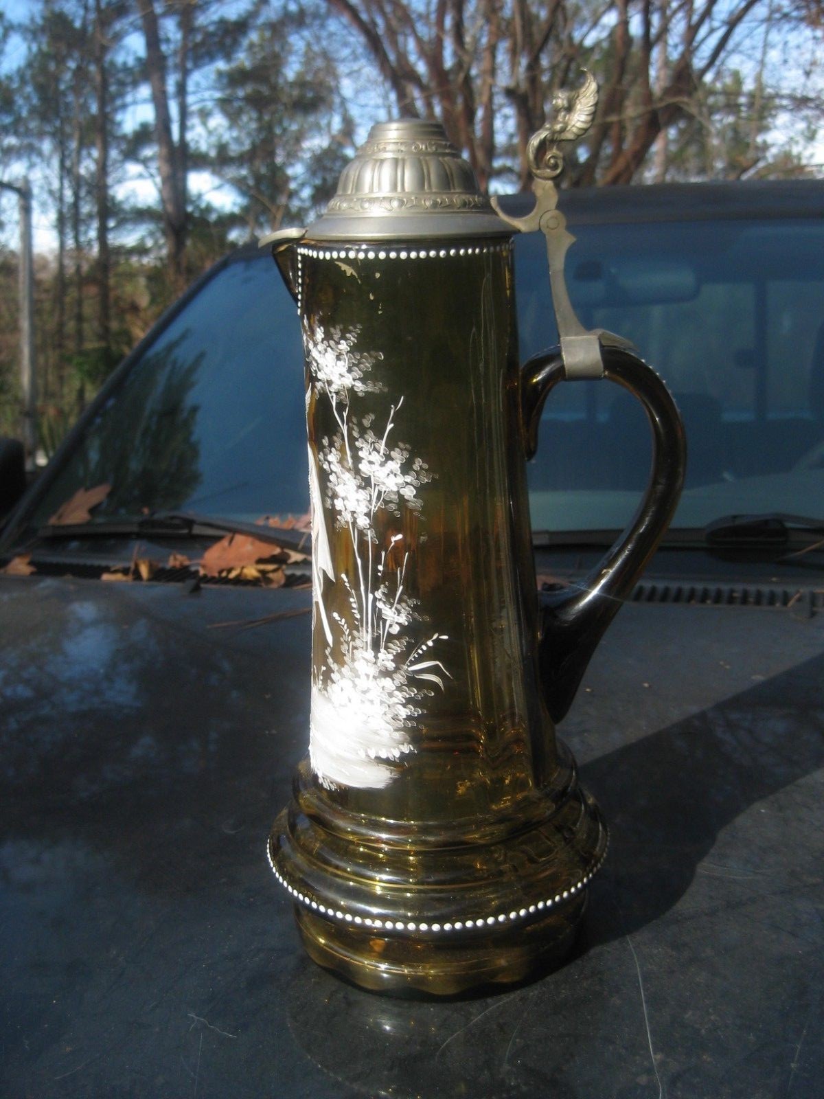 Large antique German Brueder Thannhauser Company amber glass beer stein/tankard