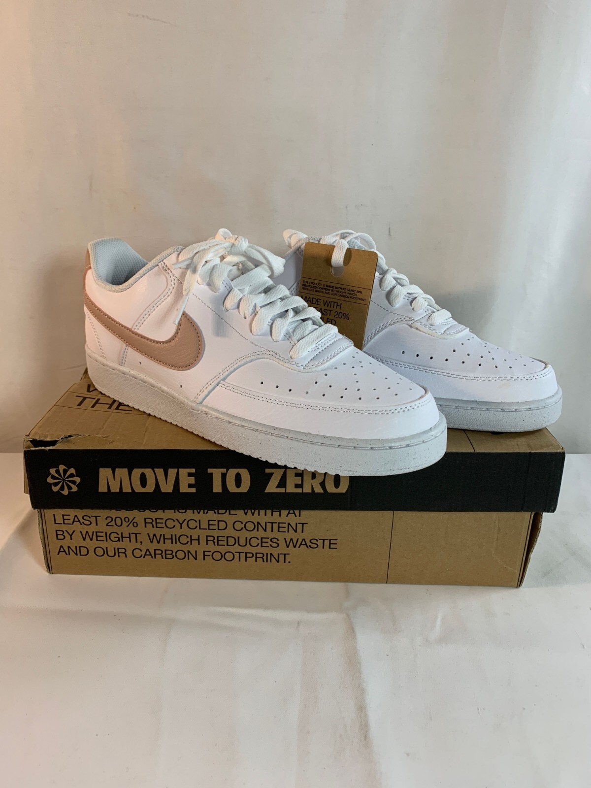 nike white and pink court vision trainers