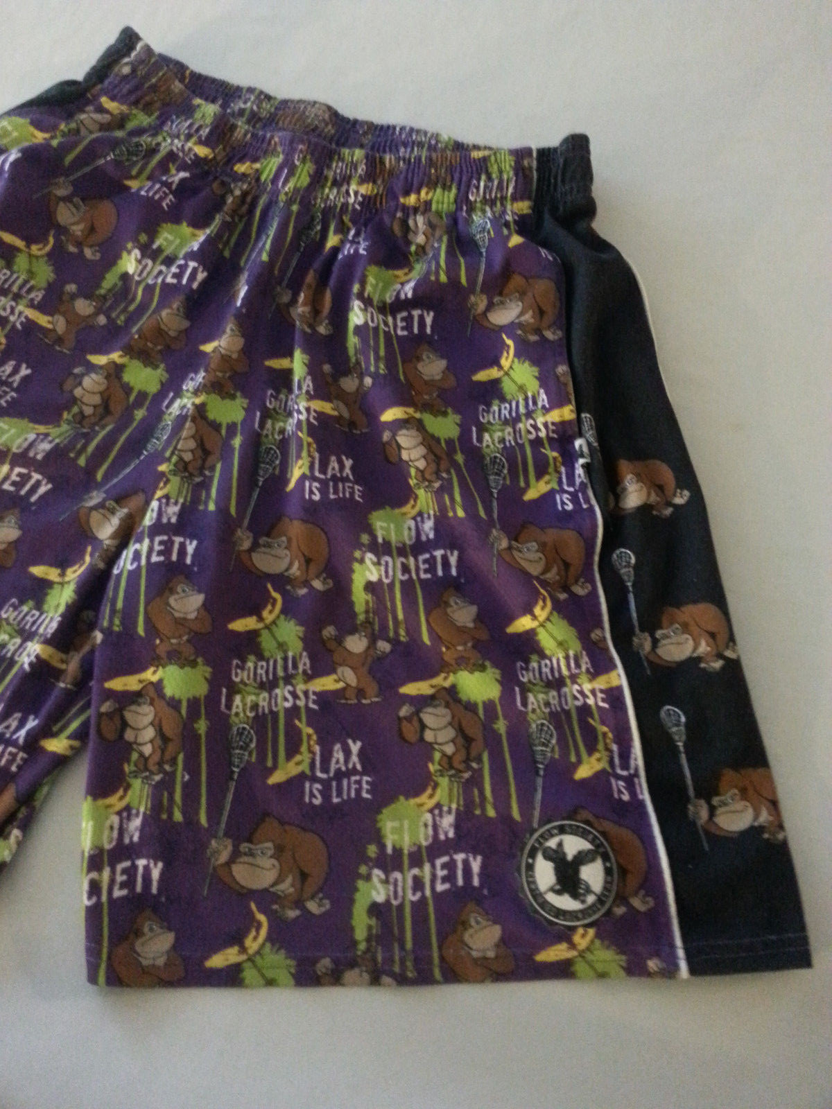 FLOW SOCIETY MENS Lacrosse LAX shorts MONKEYS MULTICOLOR LARGE EUC POLYESTER