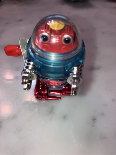 Licensed by Tomy Z WindUps Mini Robot Blue Silver Arms Red