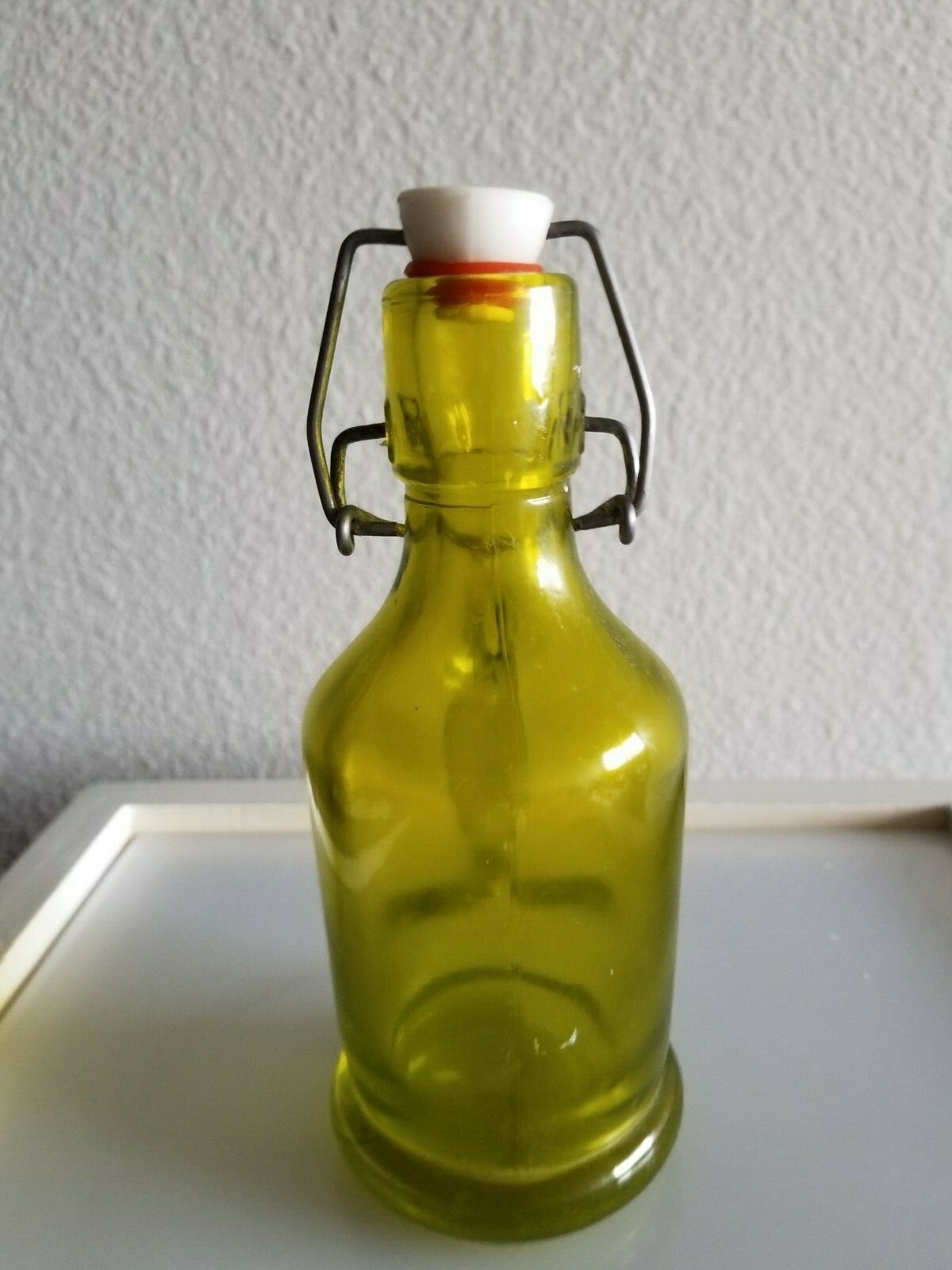 Antique Green Bottle with Handle & Ceramic Top 6 1/2