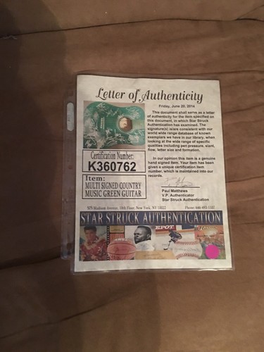 AUTOGRAPHED GUITAR WITH LOTS OF SIGNATURES FROM COUNTRY ARTISTS