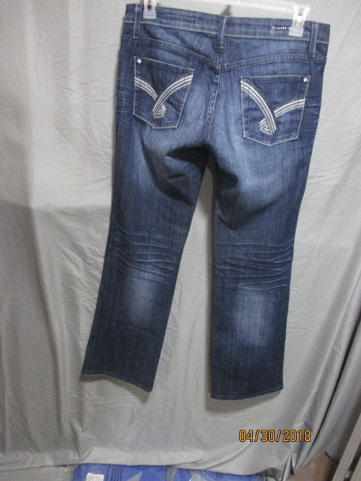 Vigoss woman's sz 11 distressed,boot cut blue denim jeans