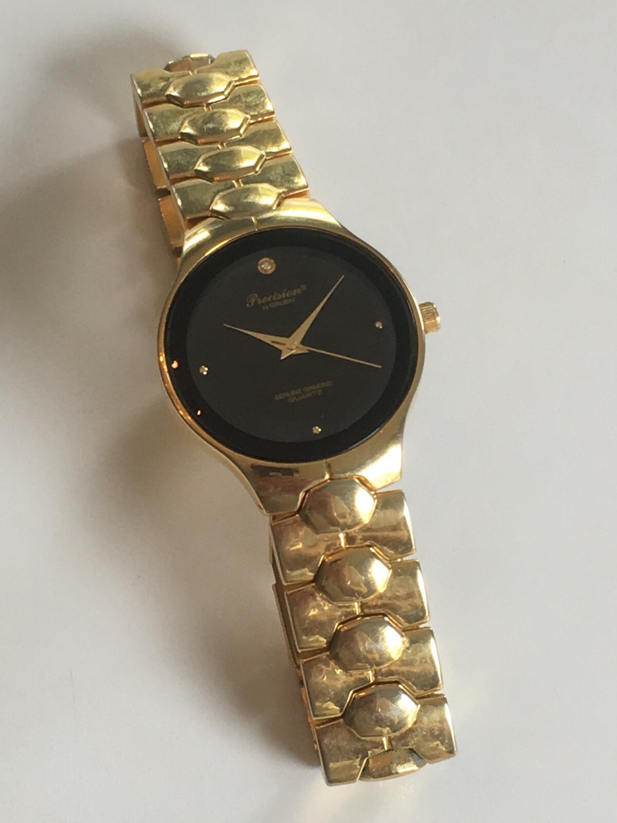 VINTAGE PRECISION BY GRUEN DIAMOND QUARTZ GOLD-TONE WRIST