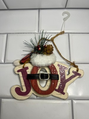 Christmas Holiday Hanging Wood 'Joy' Ornament w/ Hat, Pine Cone & Belt 6 x 5''