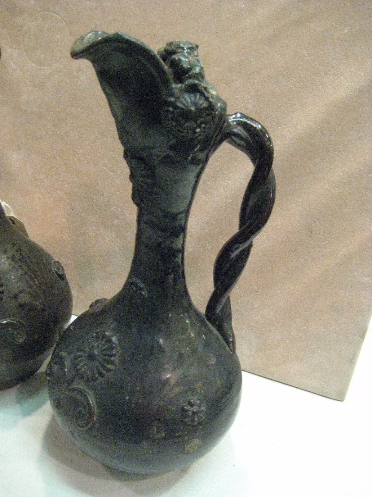RARE ASIAN PAIR OF POTTERY EWERS