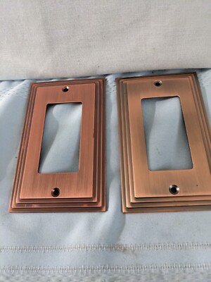 2 Brass /Copper stair step  rocker or GFCI  receptacle  Wall plate