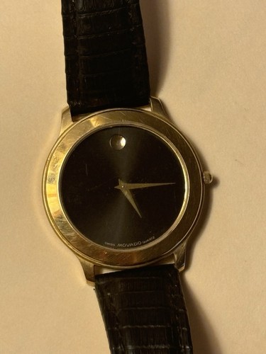 Vintage Movado Watch Gold Tone 87-D1-844 With Black Leather
