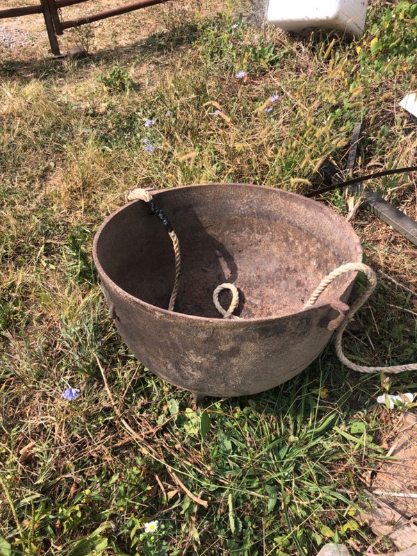 large antique iron kettle
