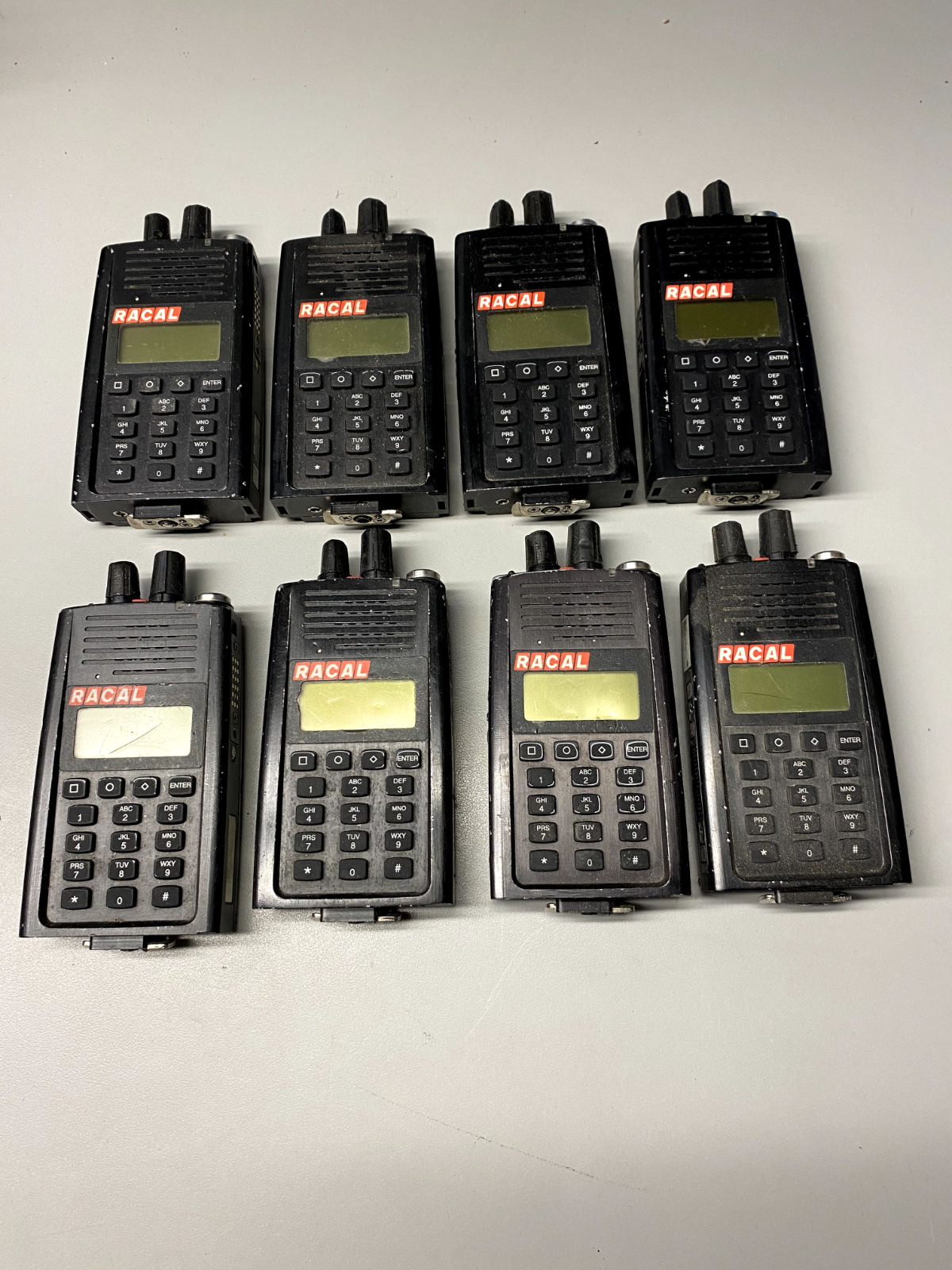Lot of (8) Thales Racal HANDHELD RADIO RACAL25 Untested As Is for parts