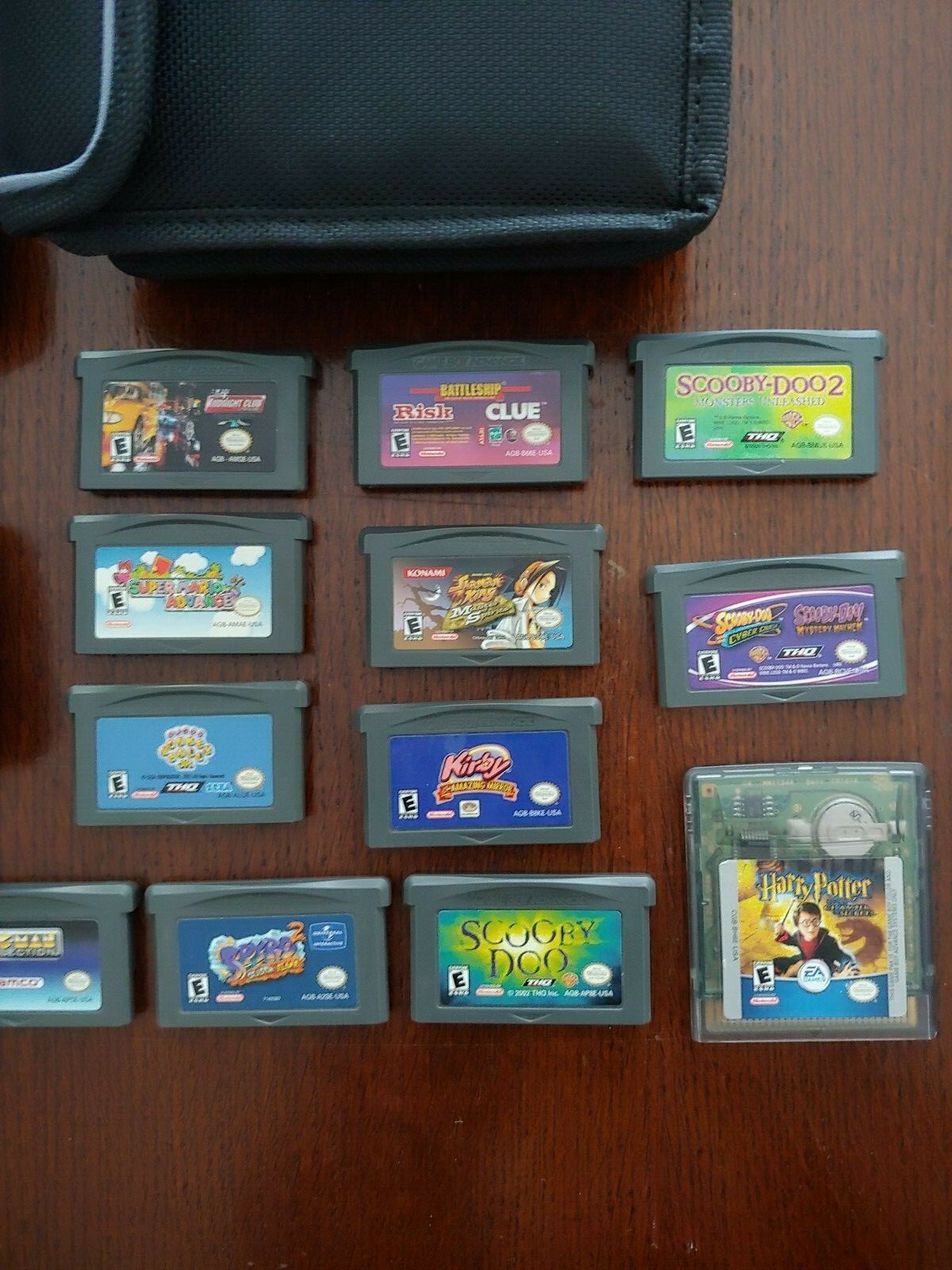2 Gameboy Advances with OEM Case, Magnifier and Light, and 14 Games COLLECTIBLE