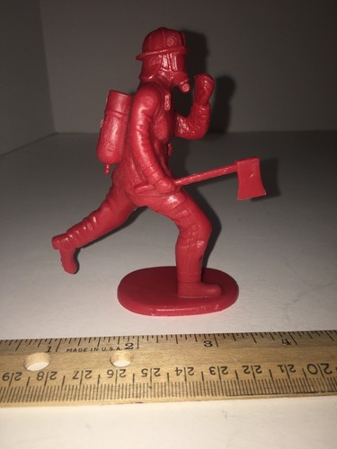 4” Tall Plastic Red Fire Man Toy