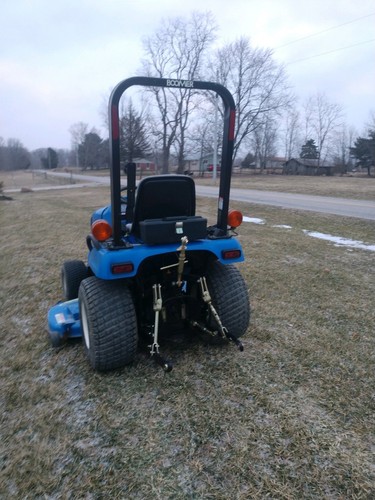 Very Clean New Holland TC25D Tractor w/belly mower CAN SHIP CHEAP