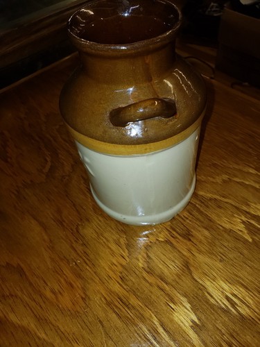 Brown And Tan Pottery Milk Jug