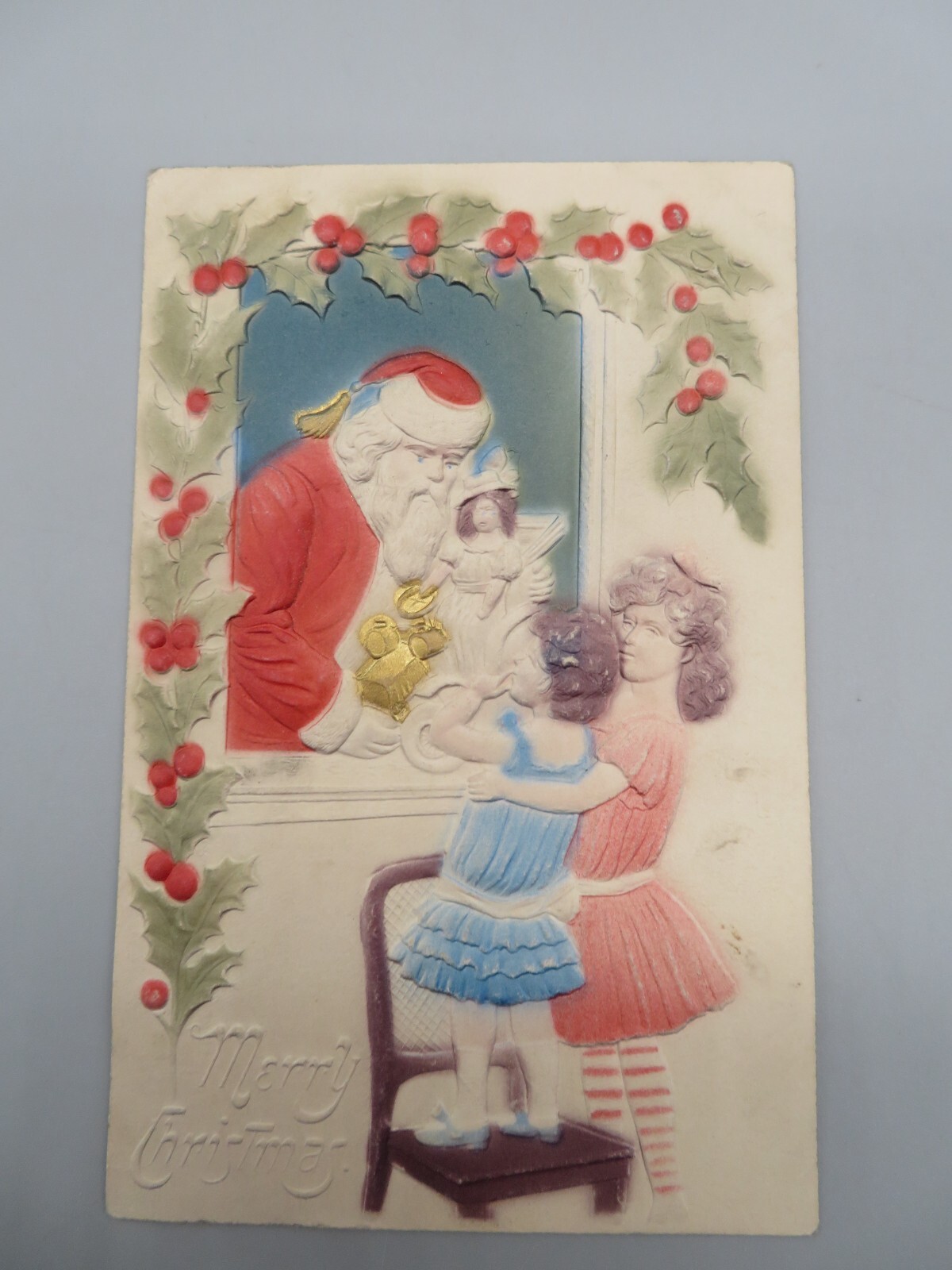Embossed Postcard Merry Christmas Santa Claus Holding Toy/Doll 2 Girls 1908