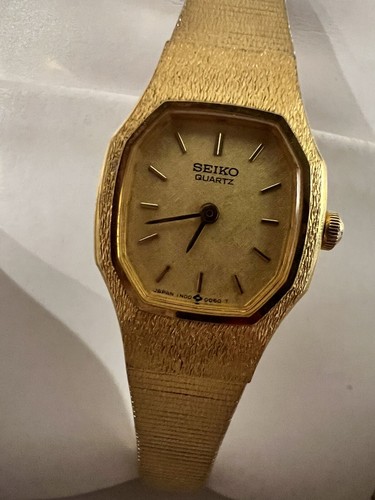 SEIKO レディースウォッチ 2Y00-5G29 ゴールド/ブラック Vintage Seiko Women Watch Gold Tone Black Wave Half Moon