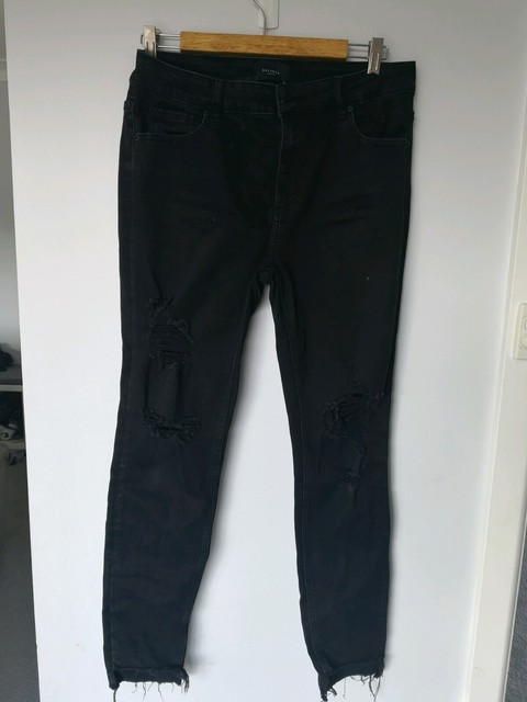 black ripped jeans size 14
