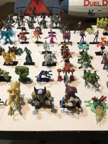 Yugioh Massive Collection!! Must See! 77 Mini Figures! Two Cases And Cards!!