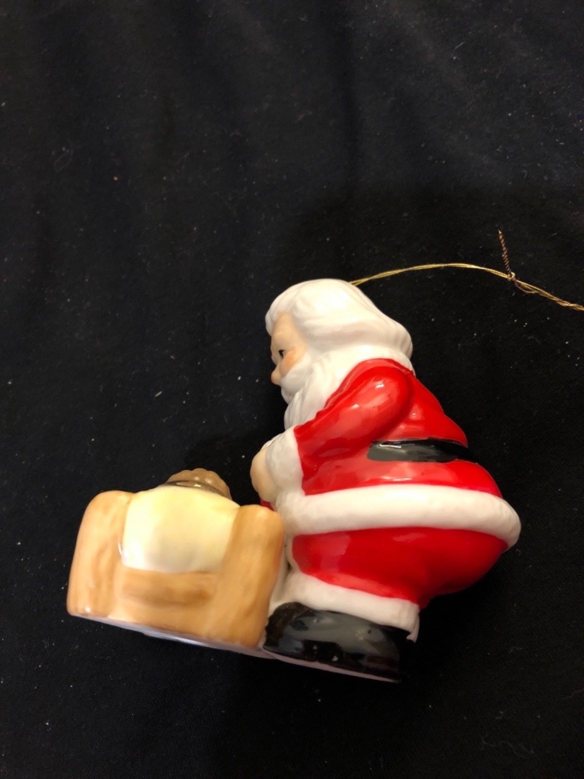 Vintage Christmas Ornament with Santa Bending Over baby Jesus, cute!