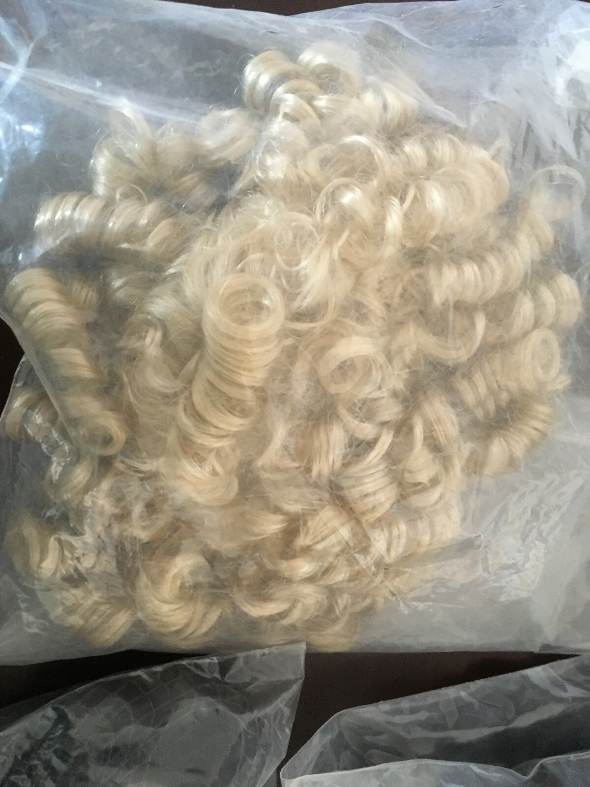 7 kemper doll wigs.  Size 12-13  NEW!!