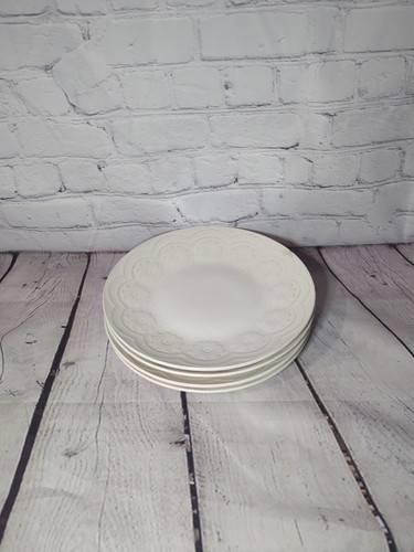 set of 4 Gibson Elite Dinner Plates embossed ivory White