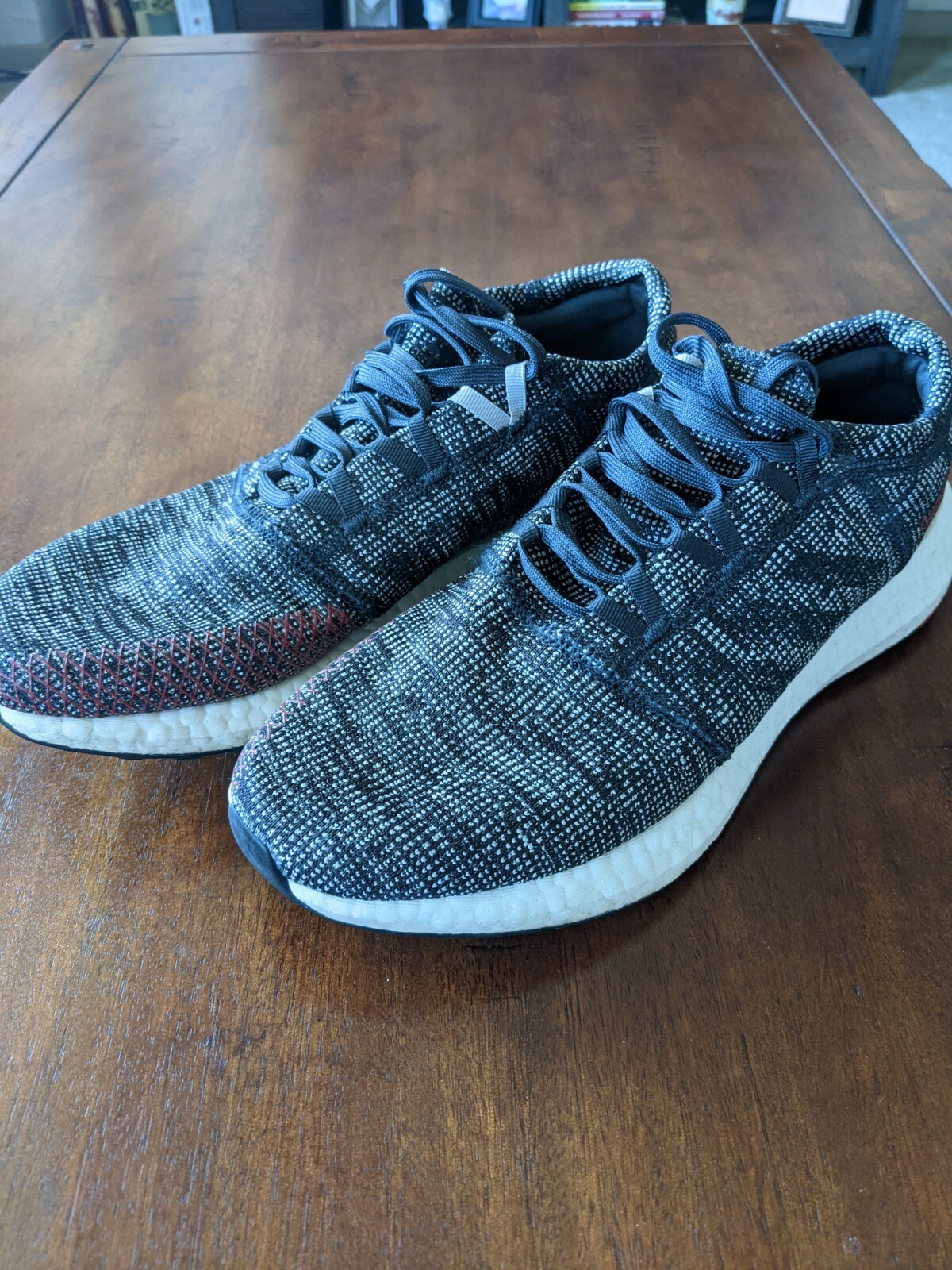 red and gray adidas shoes