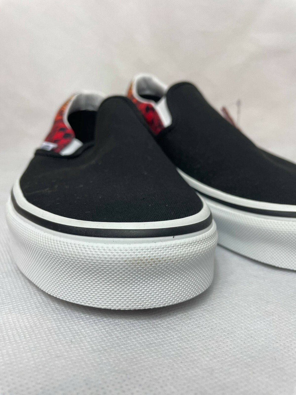 vans slip ons red flames