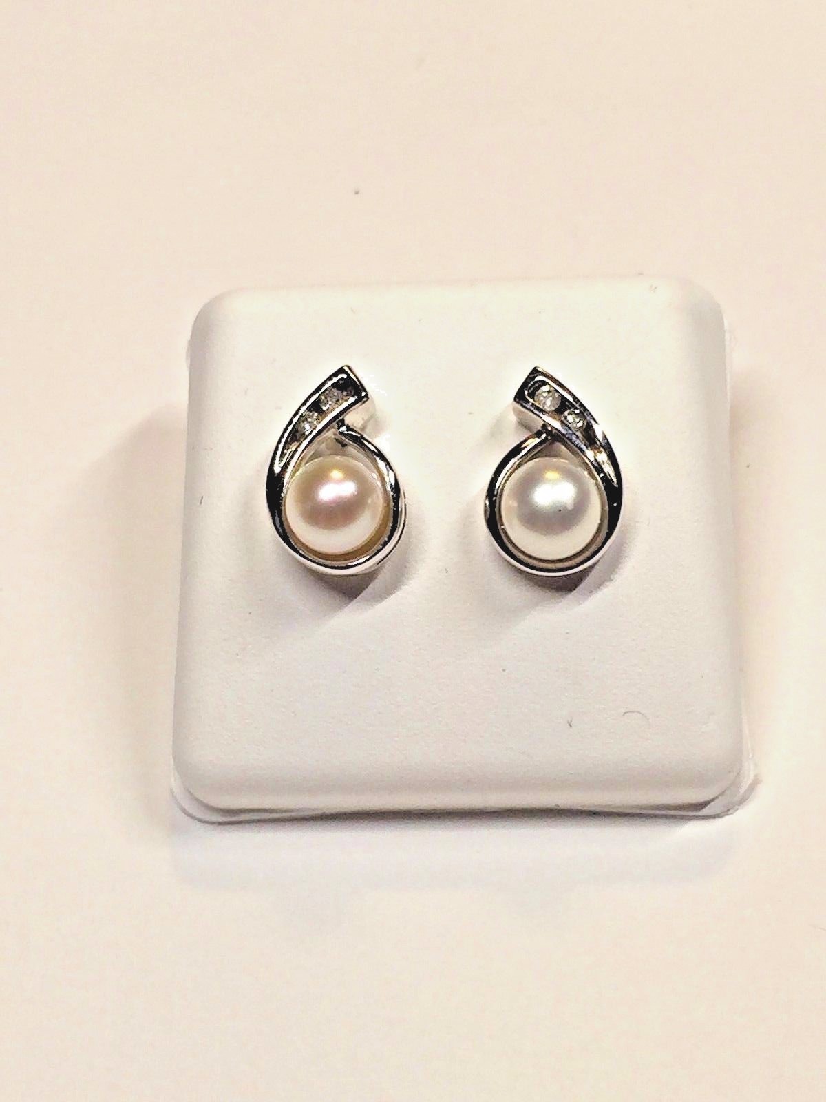 PEARL + DIAMOND PIERCED EARRINGS    RETAIL  $ 450.00