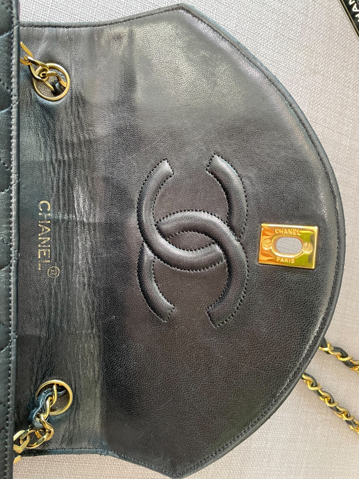 Chanel Black Curved Flap Quilted Lambskin Leather CC Half Chanel Black Curved Flap Quilted Lambskin Leather CC Half