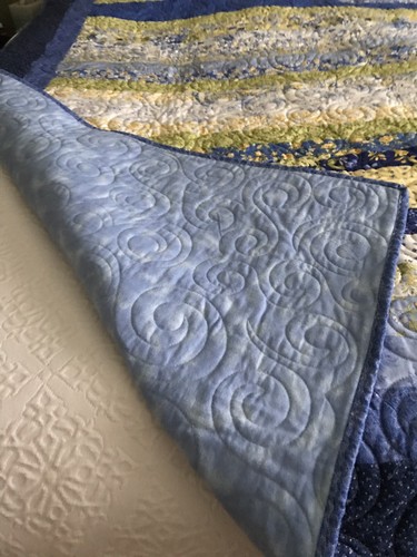 Twin Quilt Jellyroll blue yellow green print 65x76 flannel back blue & white