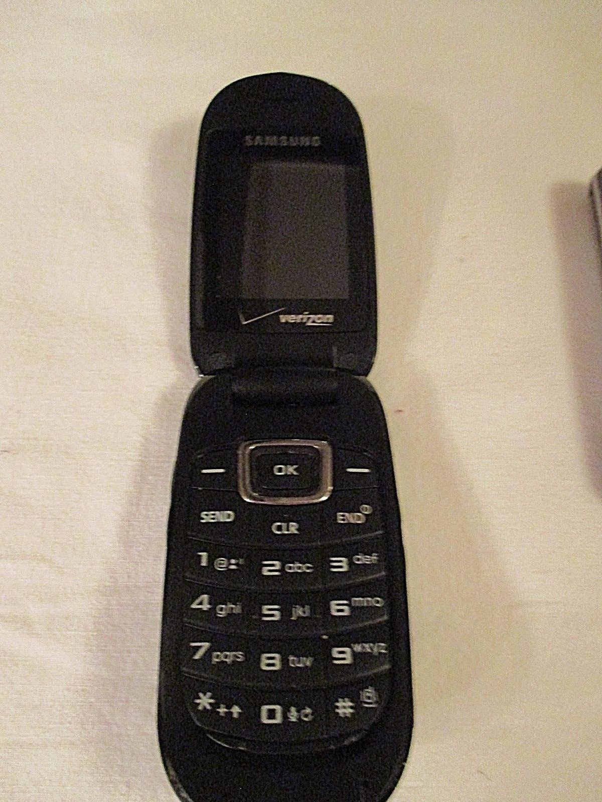 3) Cell Phones 2) SAMSUNG & 1) LG, Otterbox case 2 batteries, and 2 chargers