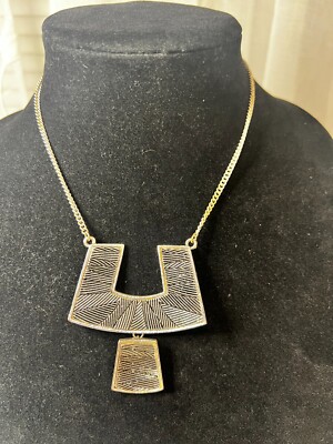 Silver tone geometric metal pendant necklace