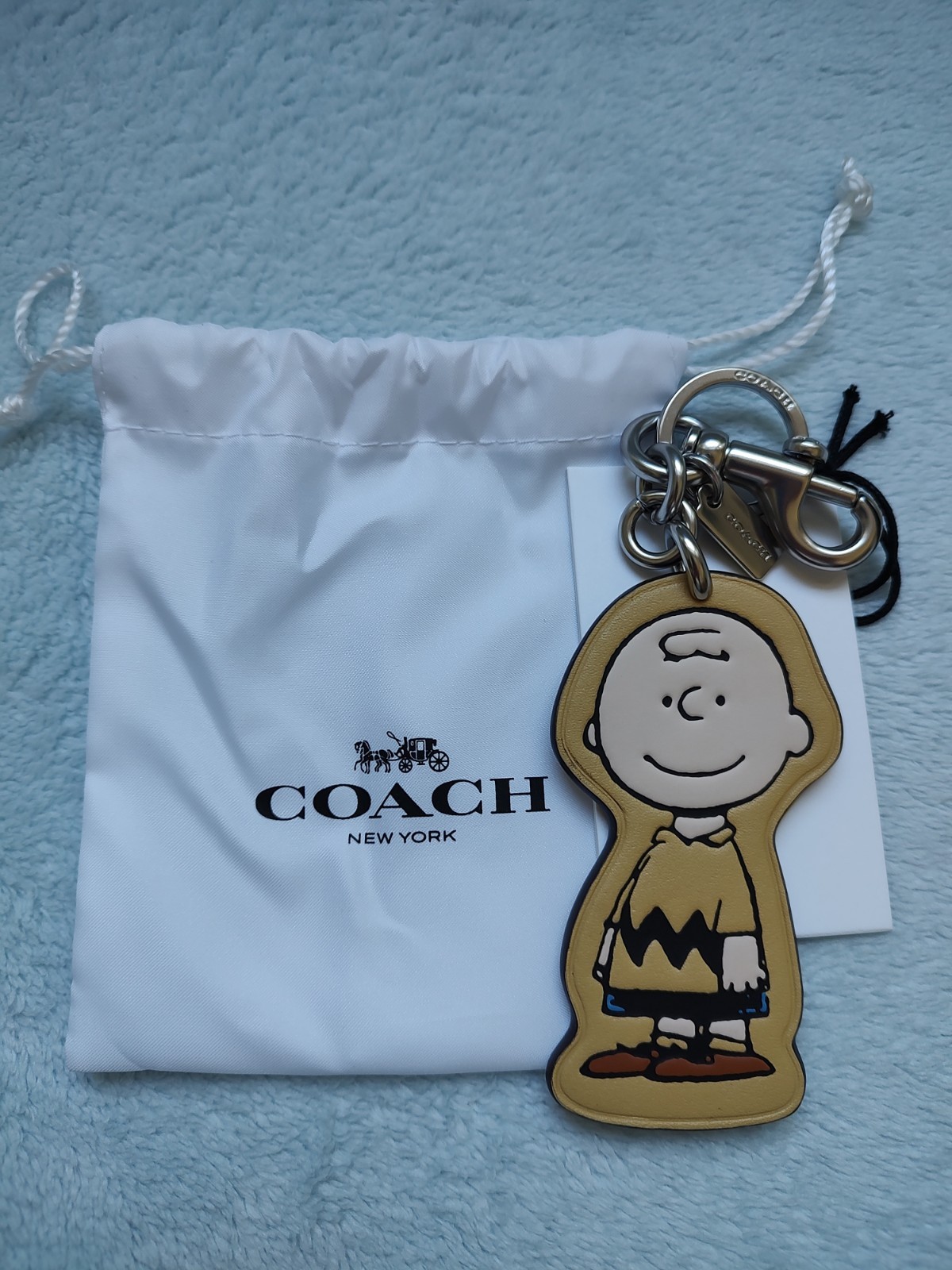 COACH X PEANUTS LEATHER CHARLIE BROWN BAG CHARM/KEYCHAIN