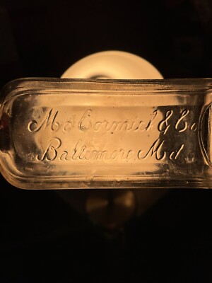 Vintage Cursive Embossed McCormick & Co Baltimore MD Bottle