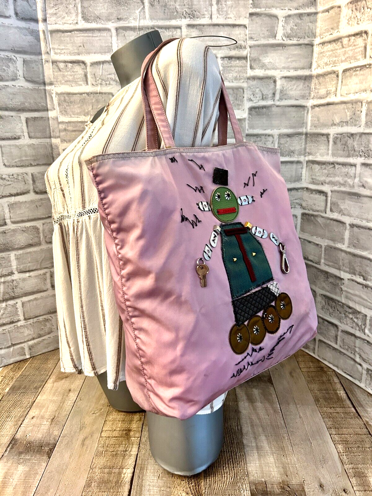 Prada robot bucket bag hotsell