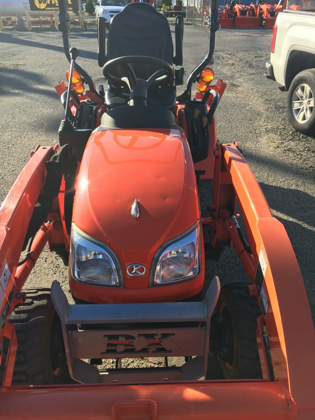 KUBOTA BX25D  TRACTOR LOADER BACKHOE WITH SOFT CAB ENCLOSURE AND HEAT