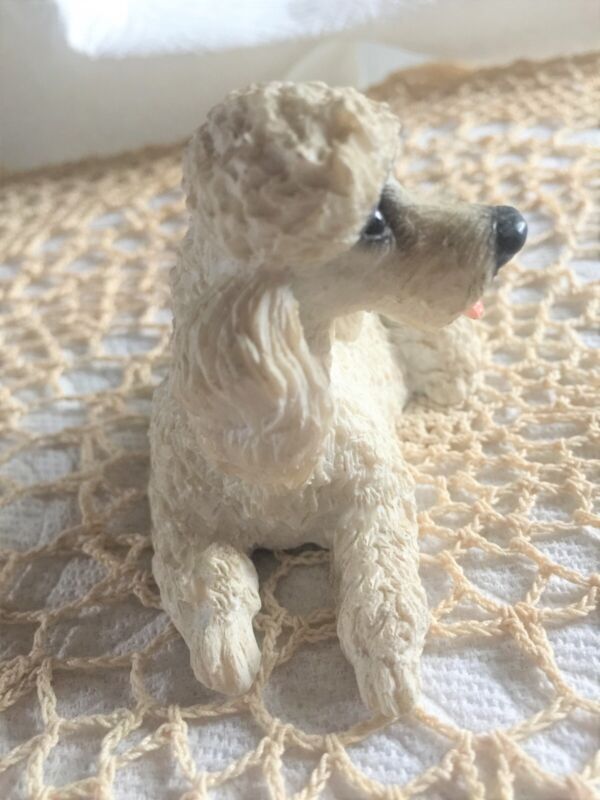 Adorable White Poodle Laying down Figurine Dog 4"X2"