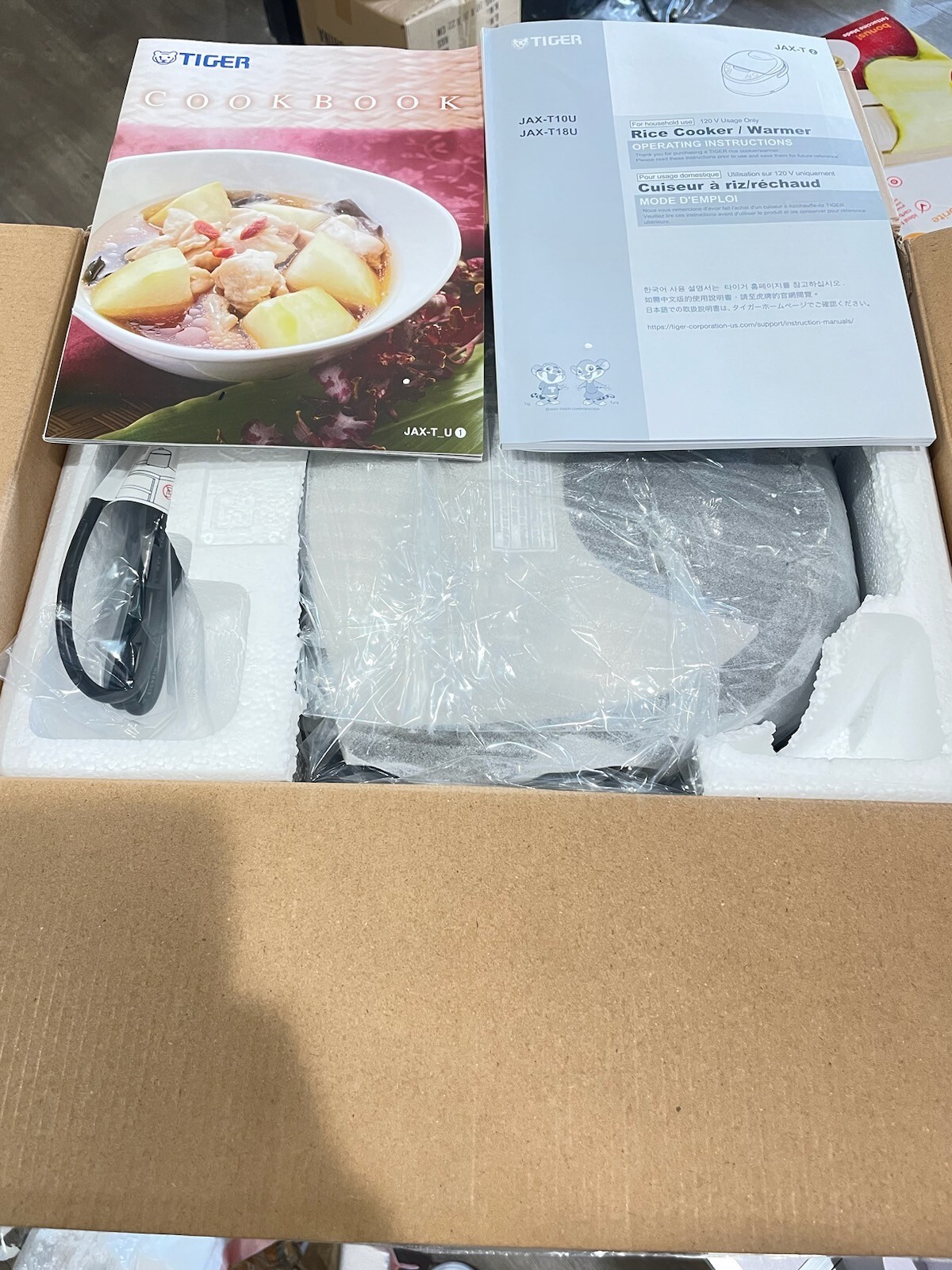 And Warmer Tiger Corporation 5. Rice Cooker