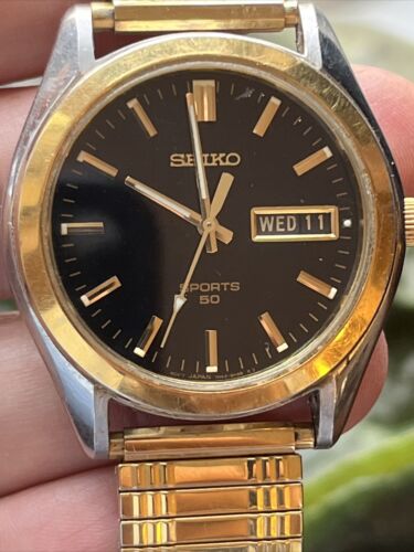 Seiko Sports 50 two tone black dial men's watch 7N43-8B49