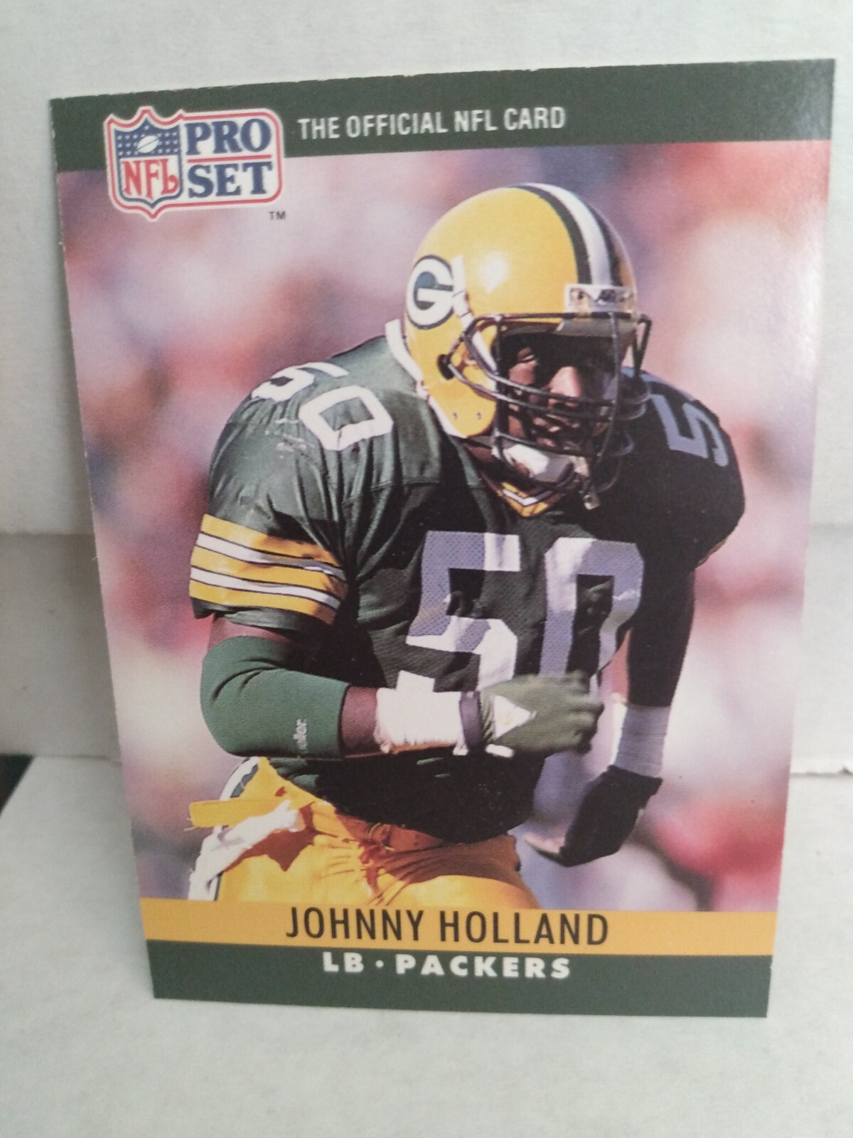 1990 Pro Set #110 Johnny Holland ERR No Name on Back Green