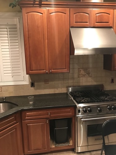 Kitchen Cabinets, Counter Tops & TV