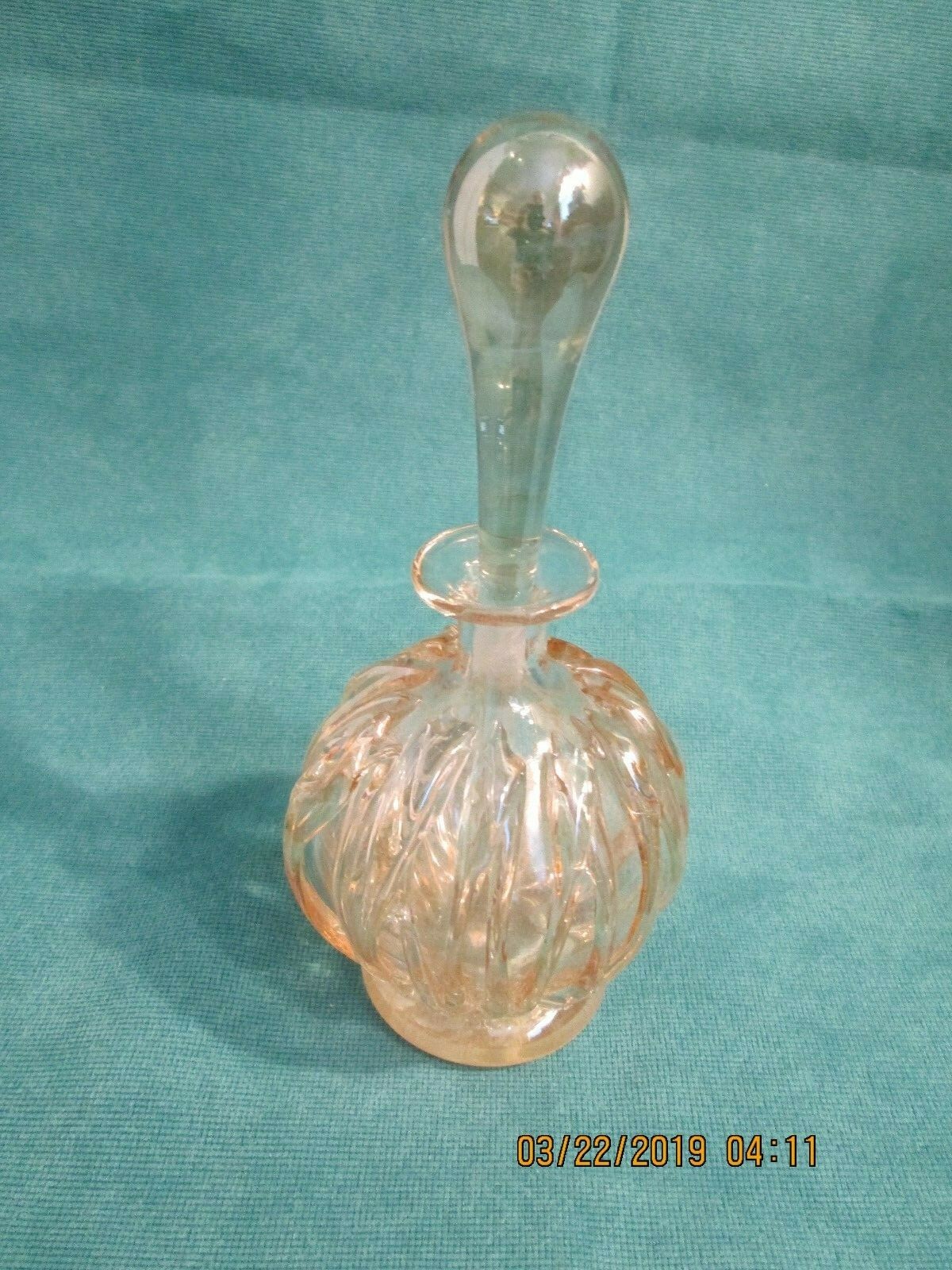 VTG. PERFUME BOTTLE. CASCADING GLASS OVER GLASS. LONG STOPPER. PALE GOLD COLOR