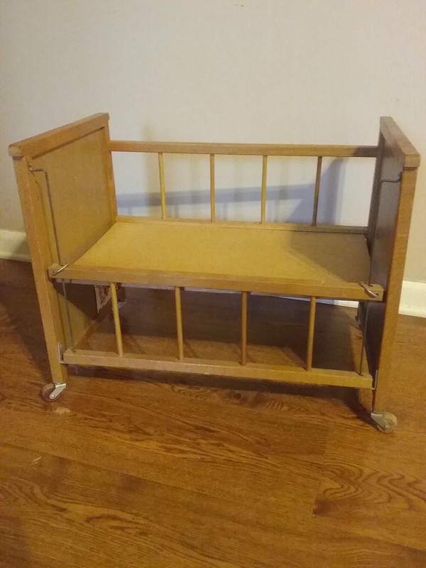 antique baby doll crib on wheels