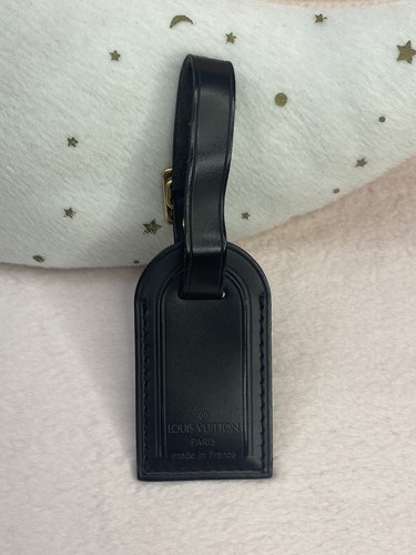 Tag With Gold Hardware