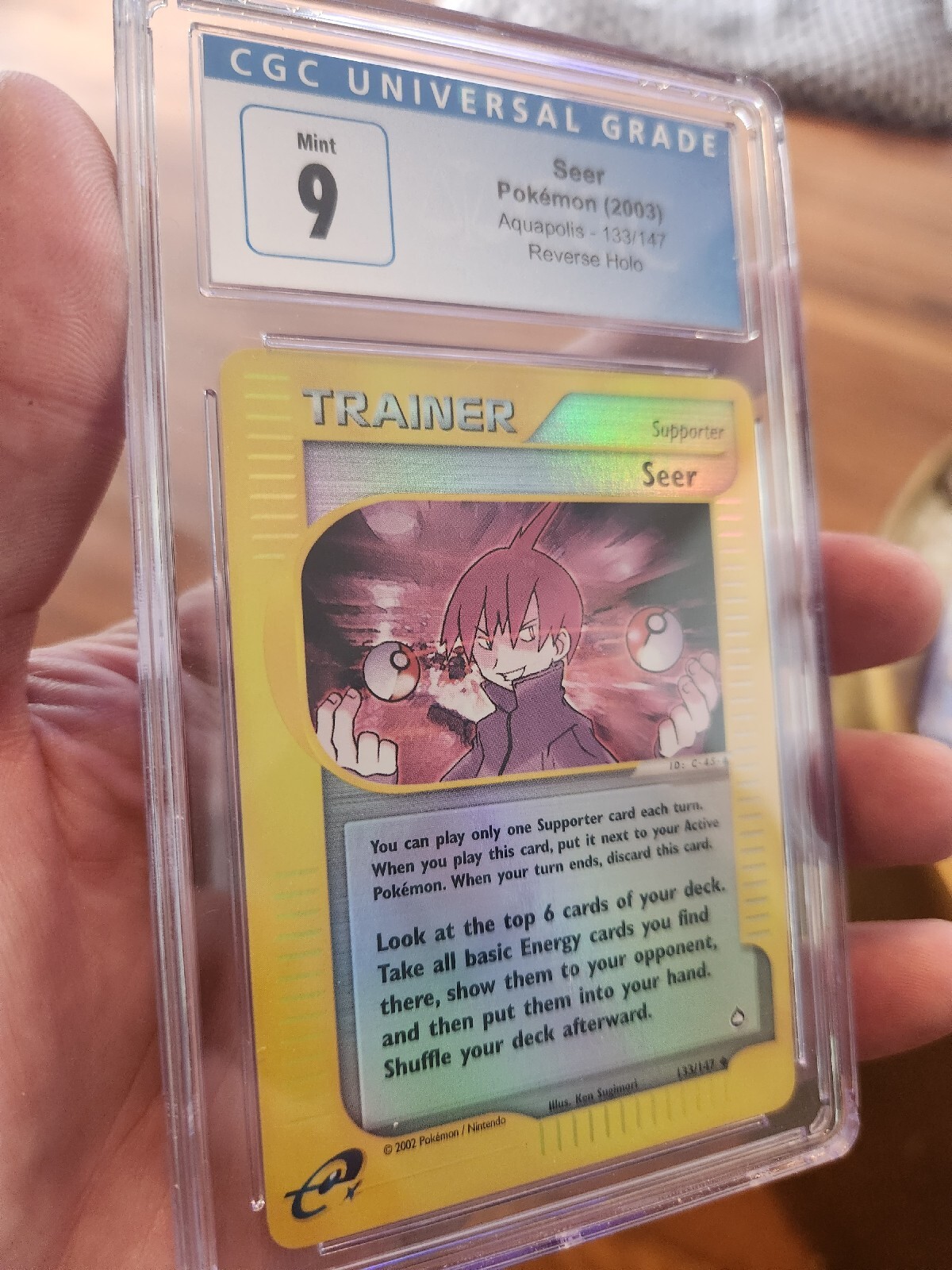 (POP 2) CGC 9 MINT Pokemon Seer Trainer 133/147 Aquapolis Reverse Holo 2003