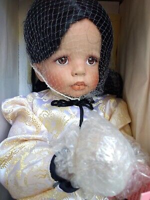 Praying porcelain doll sale