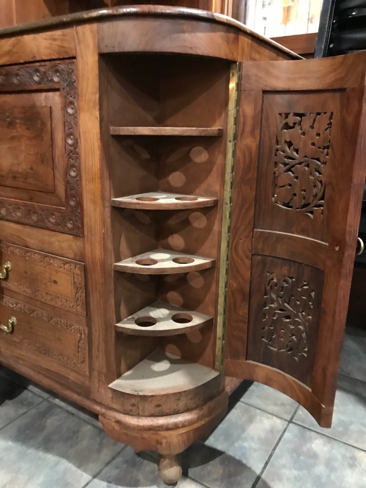 antique  bar.  ornate carving and brass inlay