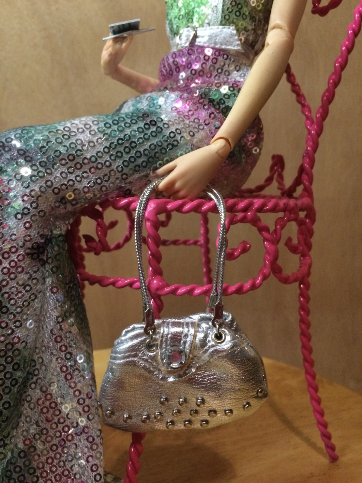 Sybarite doll superdoll superfrock in micro sequin gown, pink heels, silver bag