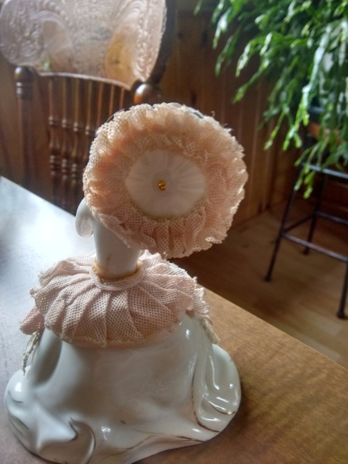 southern bell figurine with cloth dress and umbrella