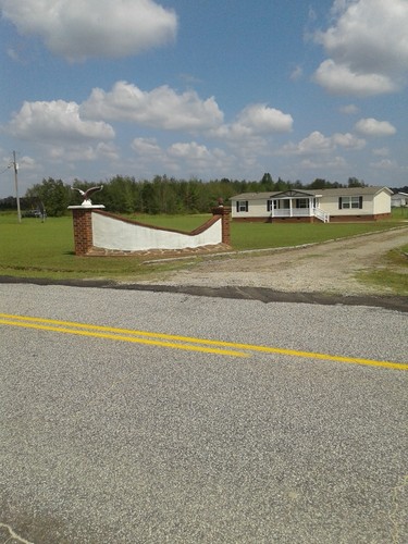Mobile home with land 7.33 acres and work shop